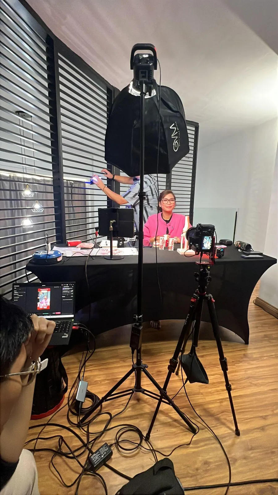 Presenter in the Esperanza live studio with camera and lighting